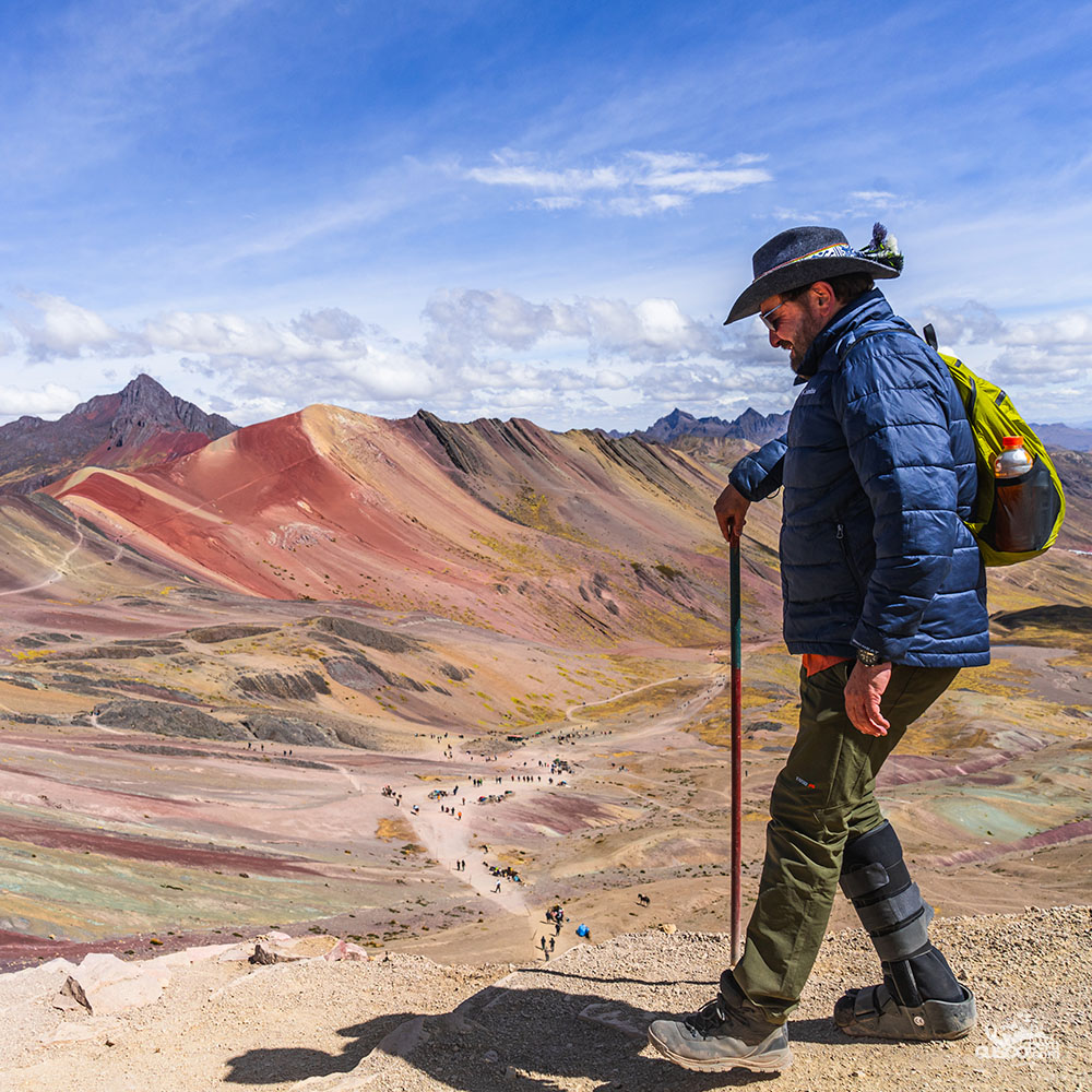 Man at 7-color mountain. Source: CuscoPeru.com