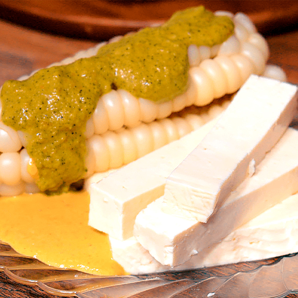 Corn with cheese is a delicious Andean dish, combining tender corn and fresh cheese. Source.CuscoPeru.com